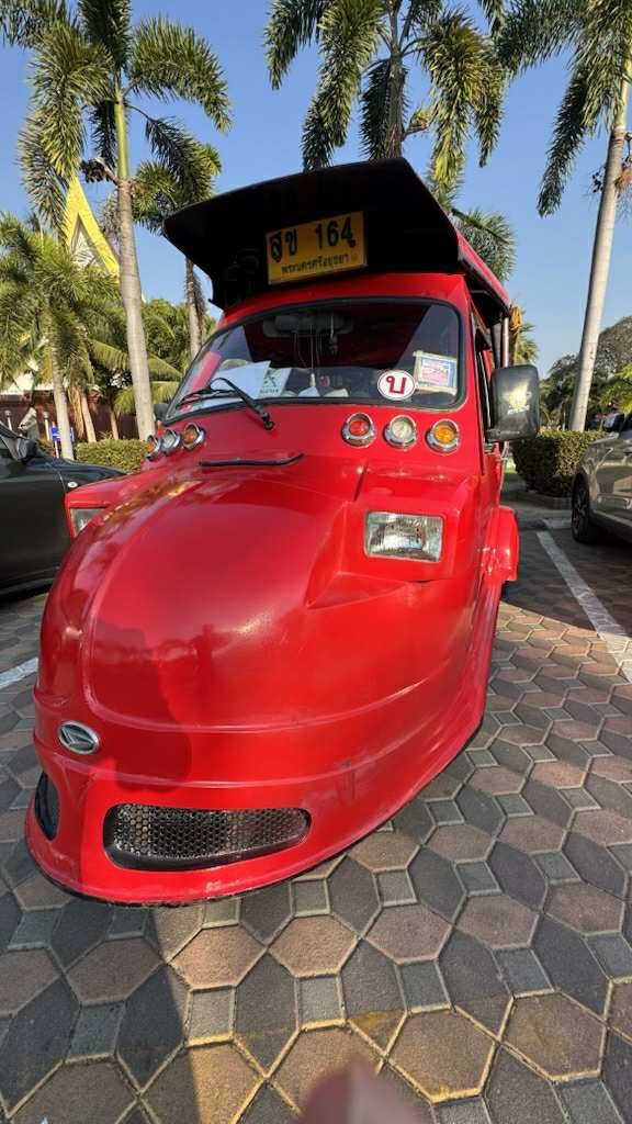 Tuk-tuk, a motorized rickshaw commonly found in Thailand.