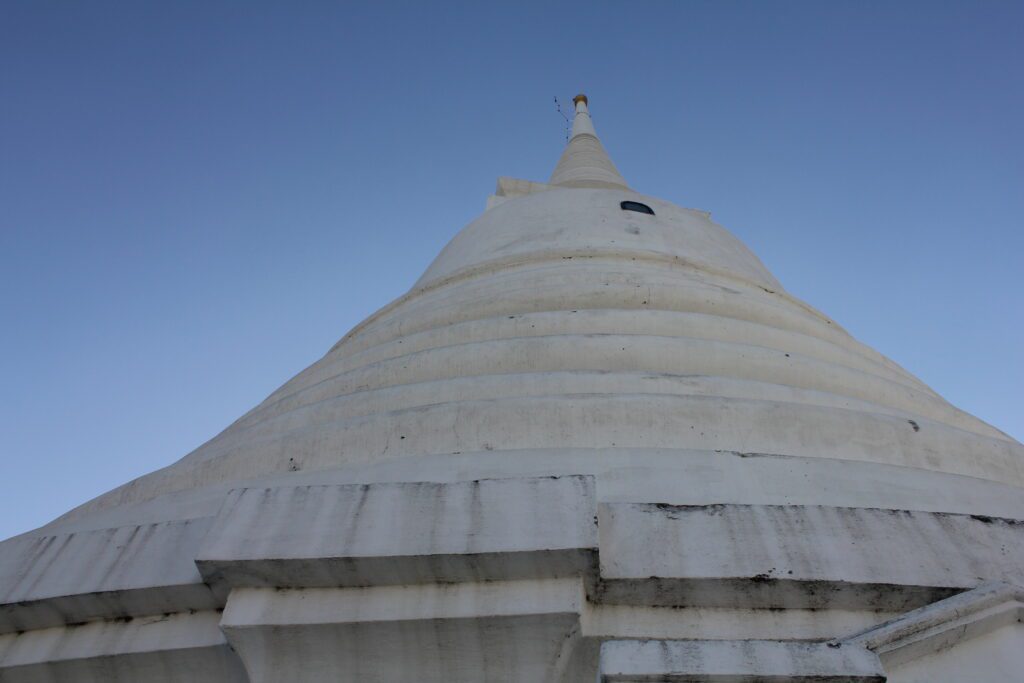 White chedi (stupa) of Wat Prayurawongsawat Worawihan, Bangkok, Thailand.