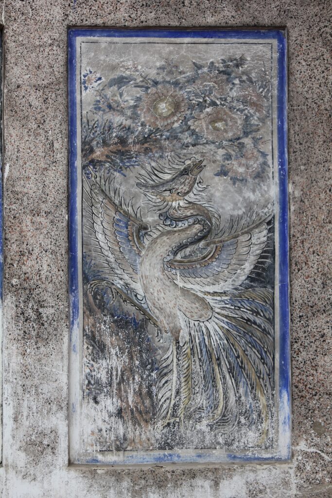 A mural of a Chinese phoenix (fenghuang) on the wall of Kian An Keng Shrine in Kudeejeen, Thonburi, Bangkok.