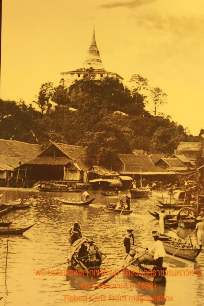 Photograph by Robert Lenz of the Golden Mount (Wat Saket) in Bangkok, Thailand, circa 1890, overlooking a busy canal.