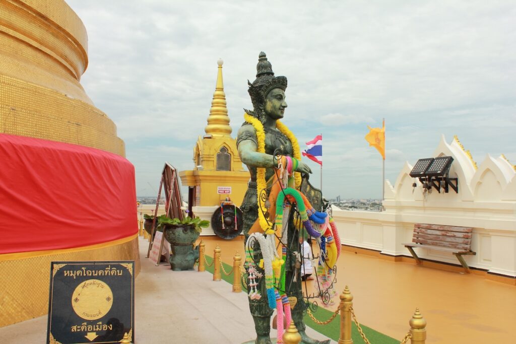 Statue at Wat Saket Ratcha Woramahawihan, also known as the Temple of the Golden Mount, in Bangkok, Thailand.