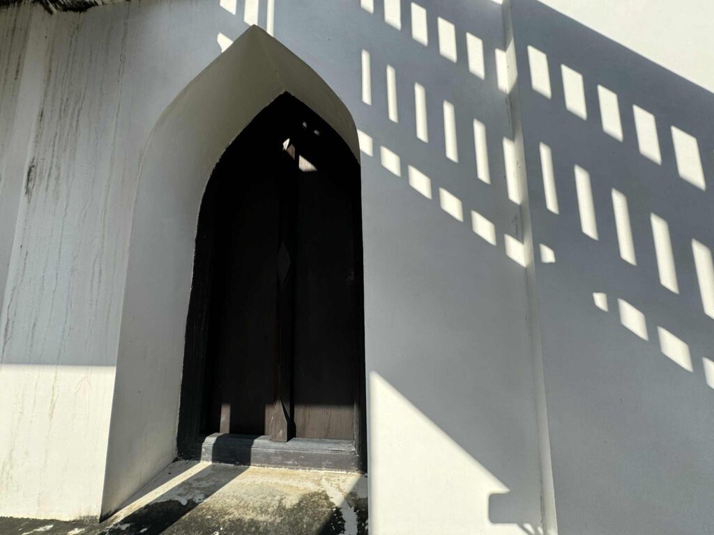 Entrance gate at Wat Phutthaisawan, a historic Buddhist temple in Ayutthaya, Thailand.