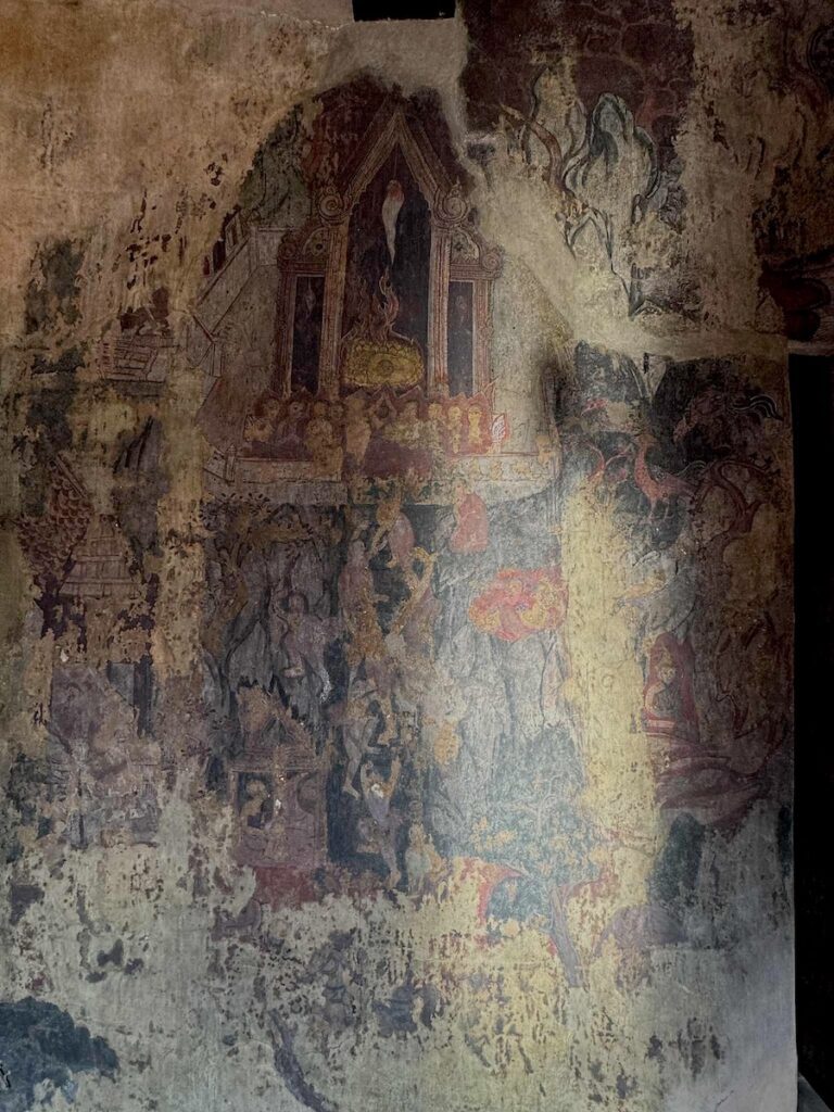 Mural from Wat Phutthaisawan, an ancient temple in Ayutthaya, Thailand, depicting Buddhist teachings.