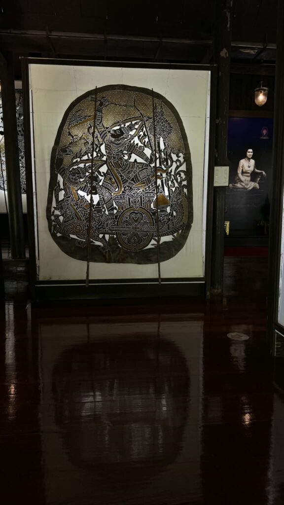 What makes Nang Yai truly captivating is not only the delicate craftsmanship of each carved figure, but also the deeper meanings hidden within. Every performance tells stories filled with moral lessons, cultural values, and echoes of history passed down through generations. It is a bridge between past and present, allowing travelers—and listeners—to feel connected across time. Even as modern entertainment and technology sweep across the world like a strong wind, Nang Yai stands firm. It survives through the unity of the community and a shared respect for Thai heritage. And as long as new generations continue to see its value and carry it forward, Nang Yai in Ratchaburi will remain—a living echo of the past, drifting gracefully into the future, like the wind that never truly fades.