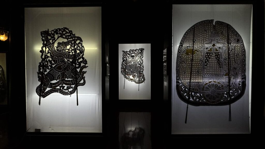 What makes Nang Yai truly captivating is not only the delicate craftsmanship of each carved figure, but also the deeper meanings hidden within. Every performance tells stories filled with moral lessons, cultural values, and echoes of history passed down through generations. It is a bridge between past and present, allowing travelers—and listeners—to feel connected across time. Even as modern entertainment and technology sweep across the world like a strong wind, Nang Yai stands firm. It survives through the unity of the community and a shared respect for Thai heritage. And as long as new generations continue to see its value and carry it forward, Nang Yai in Ratchaburi will remain—a living echo of the past, drifting gracefully into the future, like the wind that never truly fades.